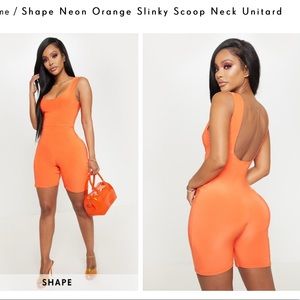Orange scoop neck body suit